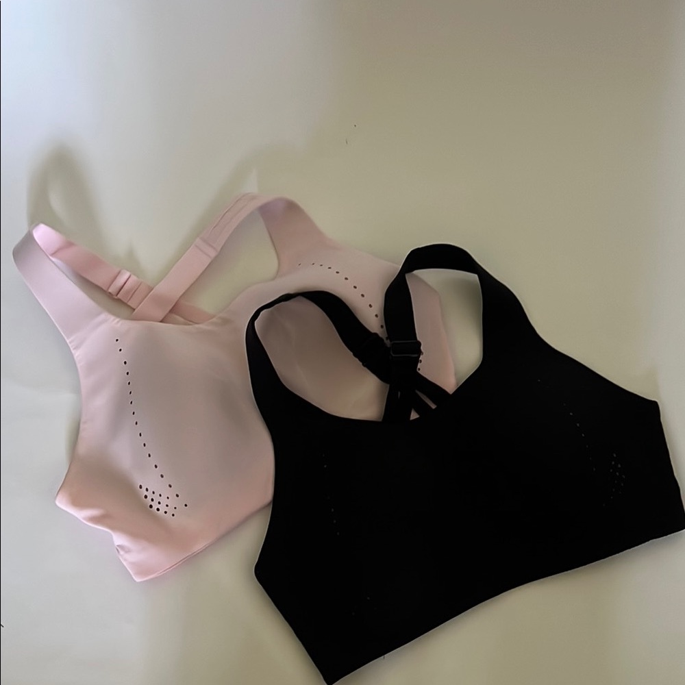 Lululemon sports bras pink and black lot of 2 Sz 34D NWOT.